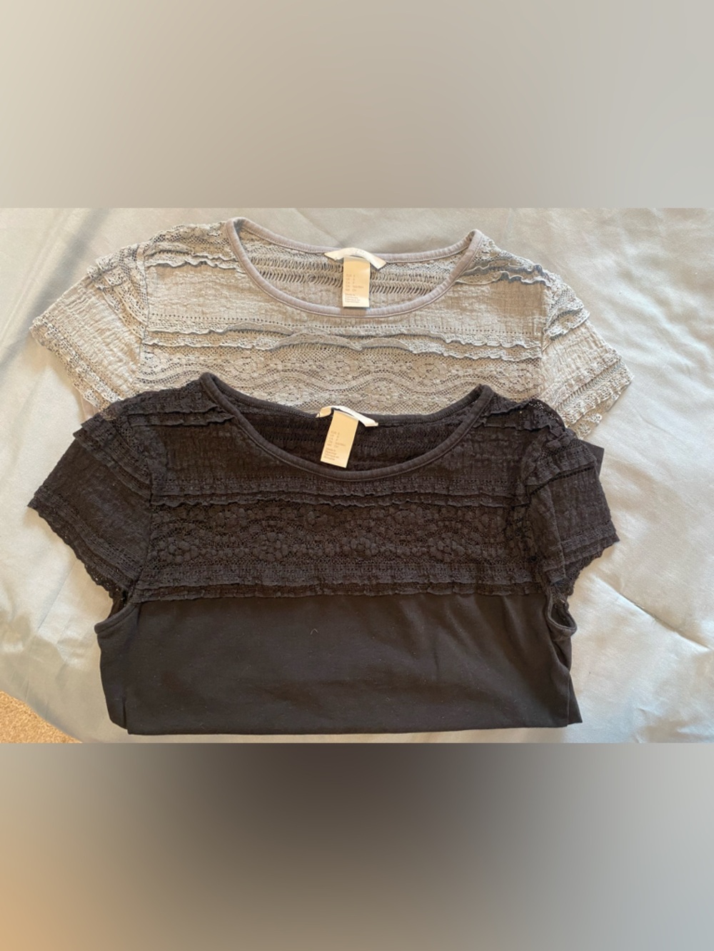 Lot of 2 H&M Short Sleeve Tops - Black and Blue/ Grey Lace Trim